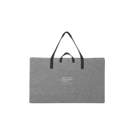 Sustainable eco-friendly insulated picnic tote with black handles on grey fabric, perfect for outdoor adventures and off-grid living.