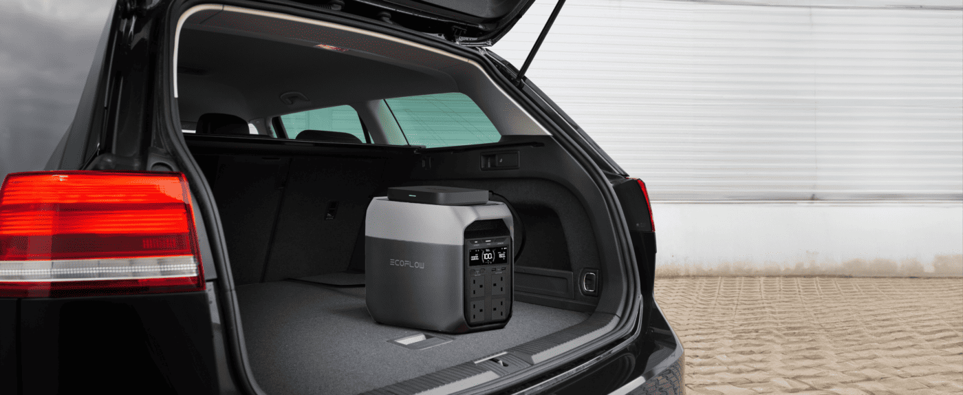 EcoFlow portable power station inside an electric vehicle trunk, renewable energy, off-grid living, mobile power supply, sustainable camping gear, Irish outdoor lifestyle, eco-friendly energy solutions, van life accessories, solar power backup, eco-conscious travel.
